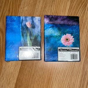 Two brand new photo albums (in plastic wrap)